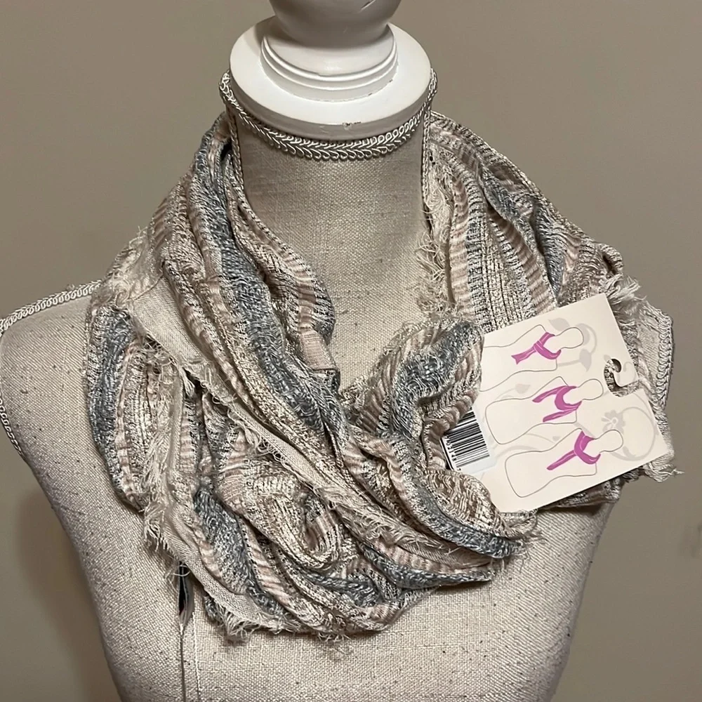 Three scarves. Black, neutral , brown colors . New